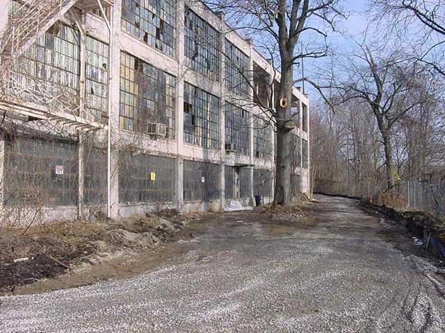 rotating picture of abanonde buildings and staff conducting assessments