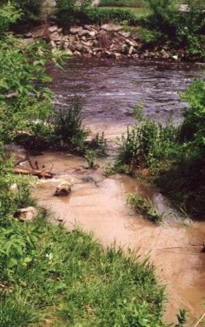 Sediment laden tributary stream