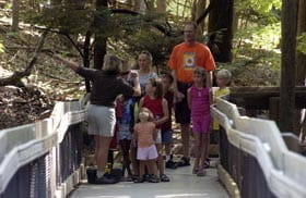Family walking along outdoor stairway at Gillette Visitor Center