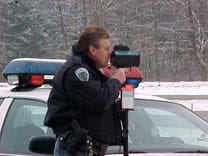 Police officer radar gun image
