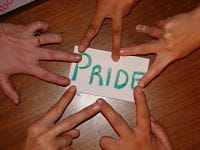 CCL particpants show their pride by having their hands surround word CCL particpants show their pride by having their hands surround word