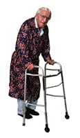 Elderly man walking with a walker