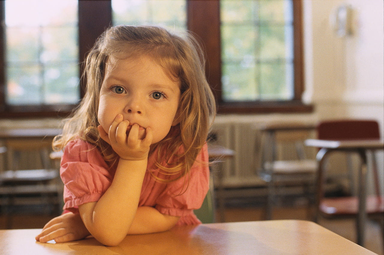 Little girl at desk