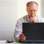 man working on laptop computer
