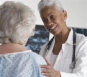female doctor treating woman