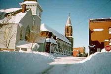Winter Scene of Calumet Historic District Church and Downtown Buildings