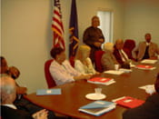Parole Board members discuss the intensive re-entry program with staff at Cooper Street Correctional Facility
