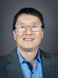 Commissioner Hoon-Yung Hopgood Headshot