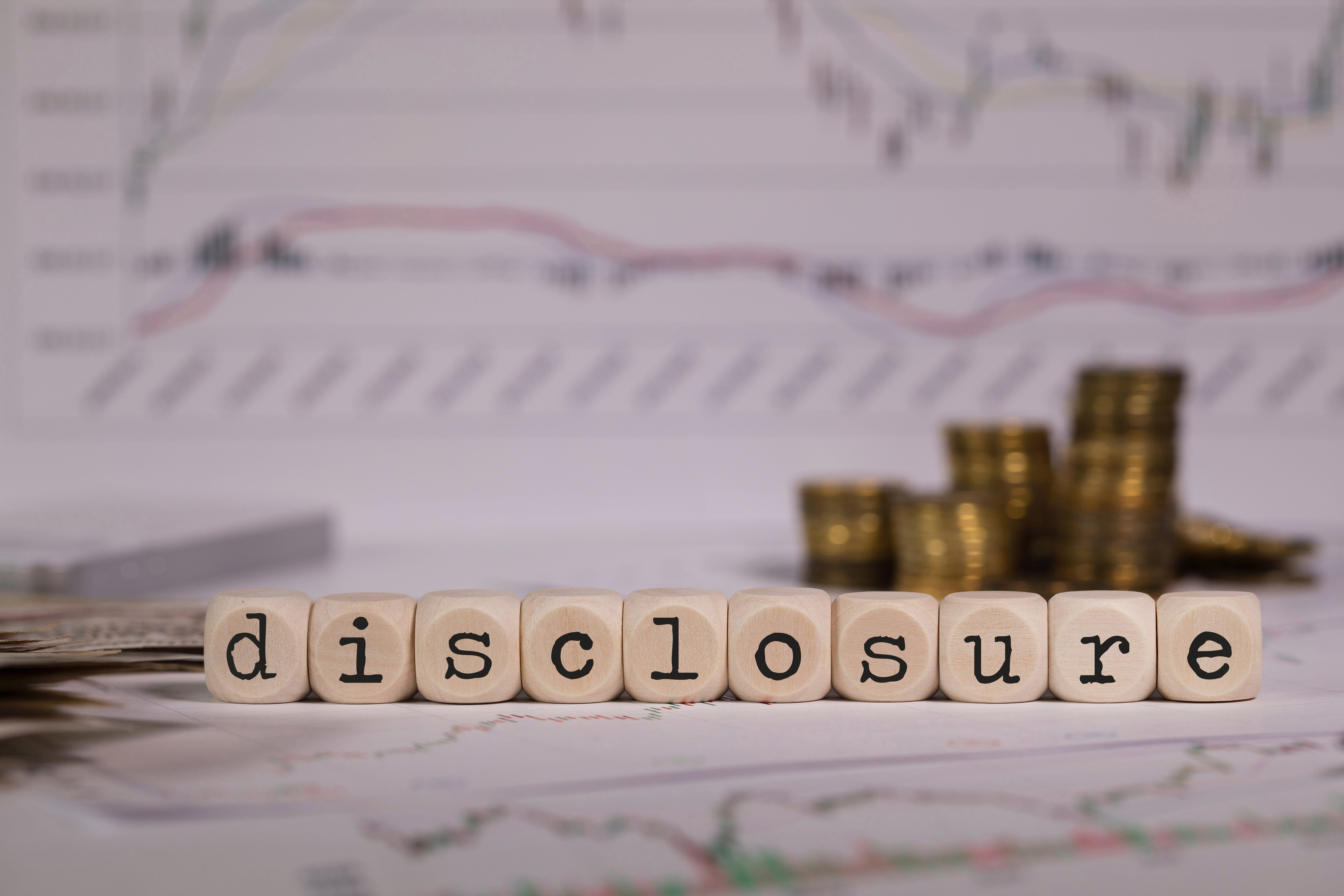 Word "disclosure" composed on wooden leters