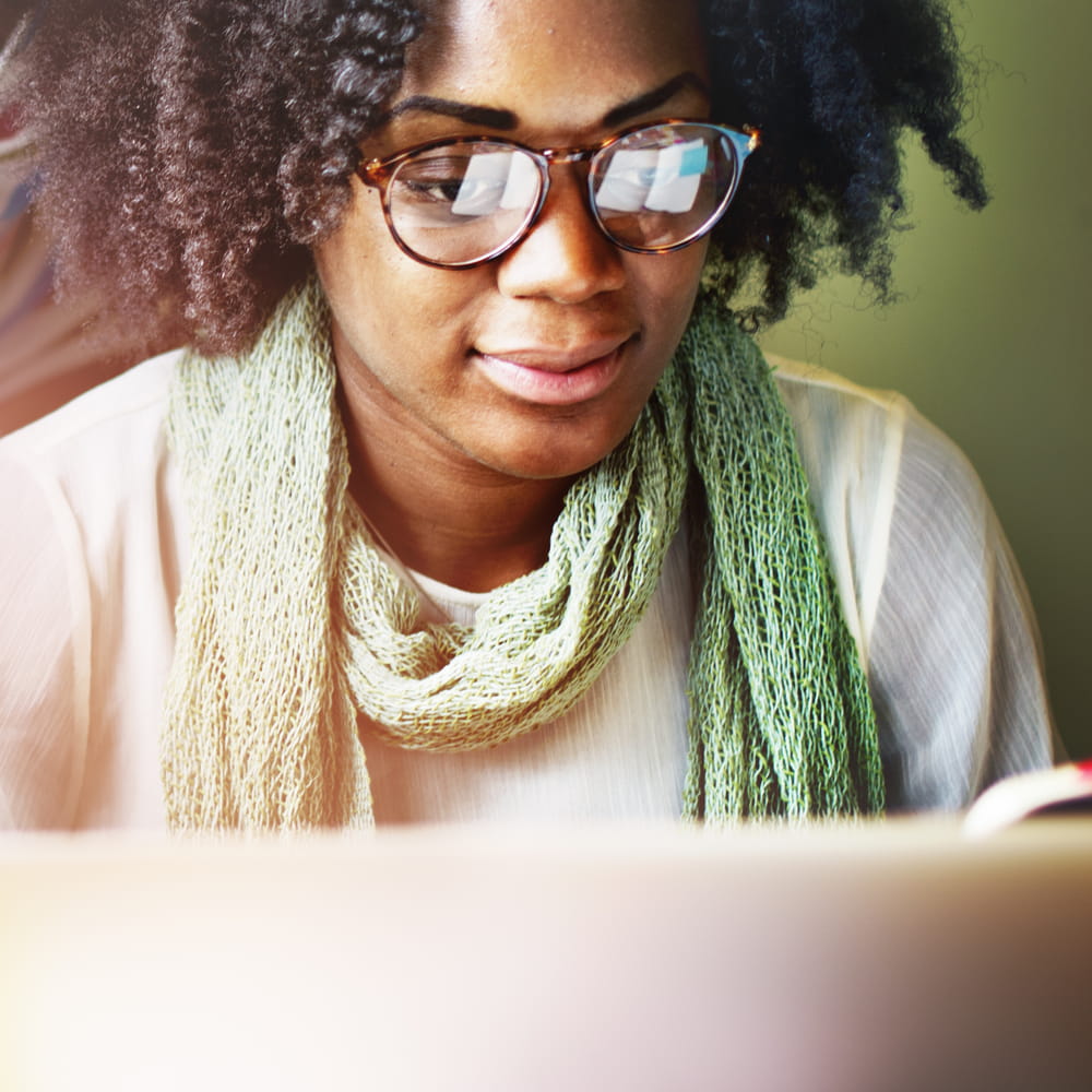 Black woman using a laptop computer