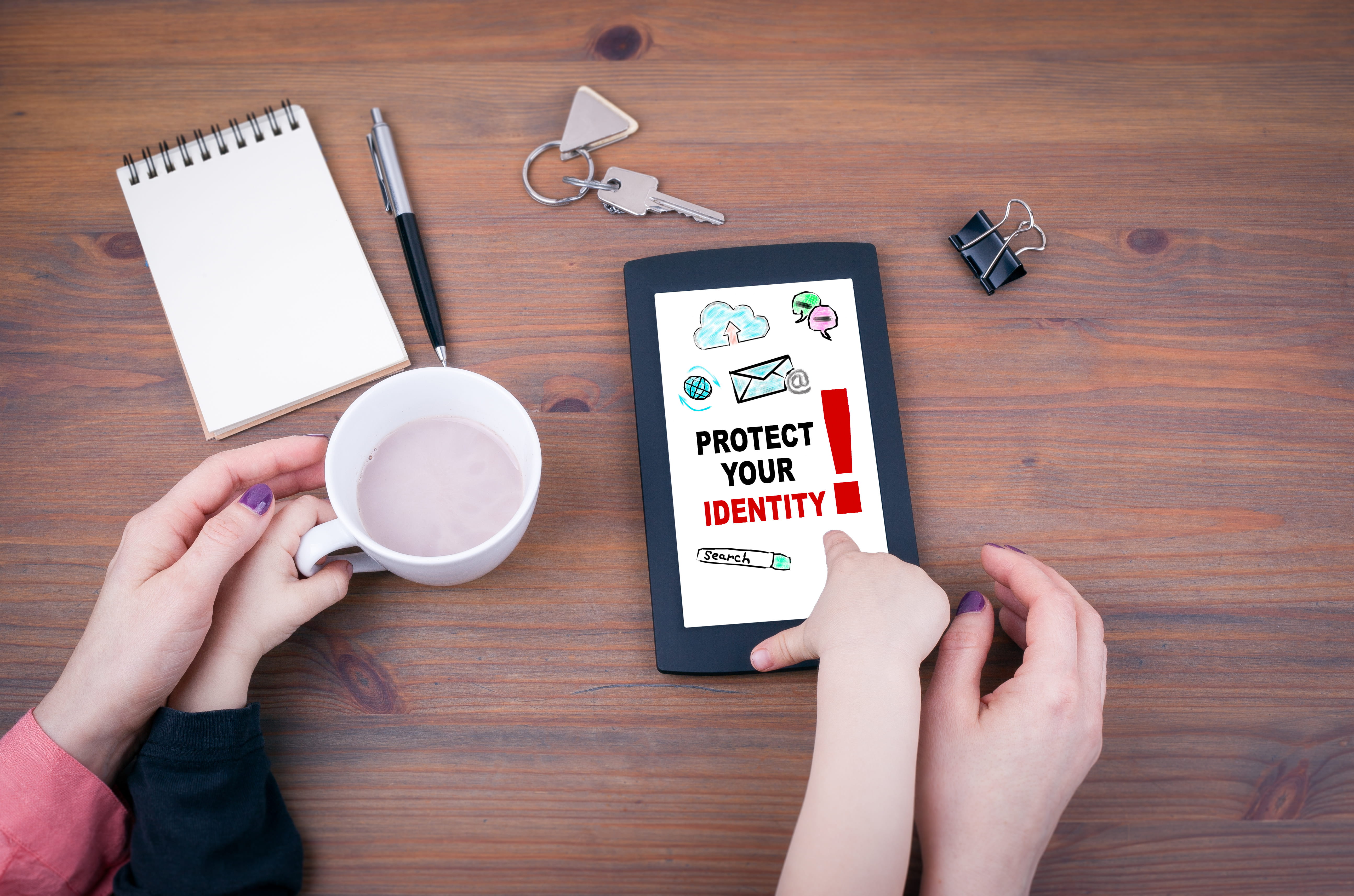 Protect your identity. Mother and kid play at tablet computer