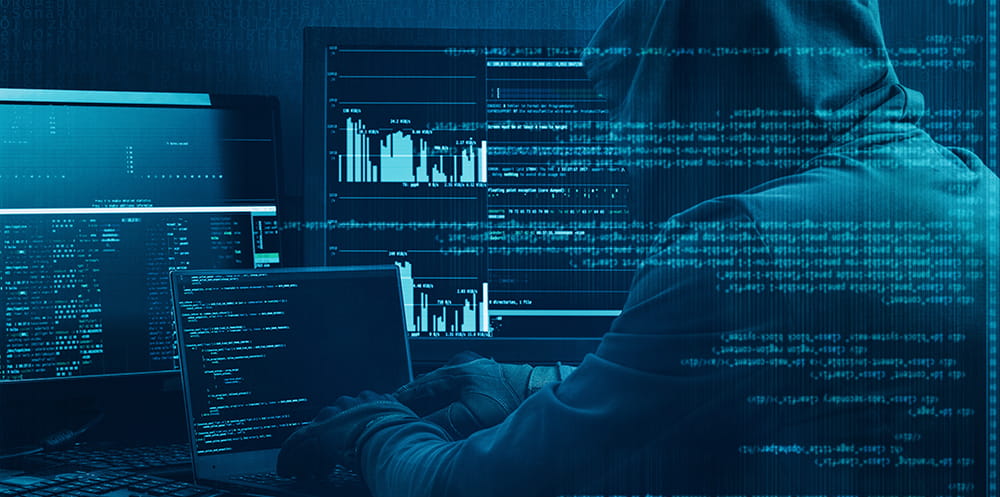 Hacker working on a code on dark digital background with digital interface around.