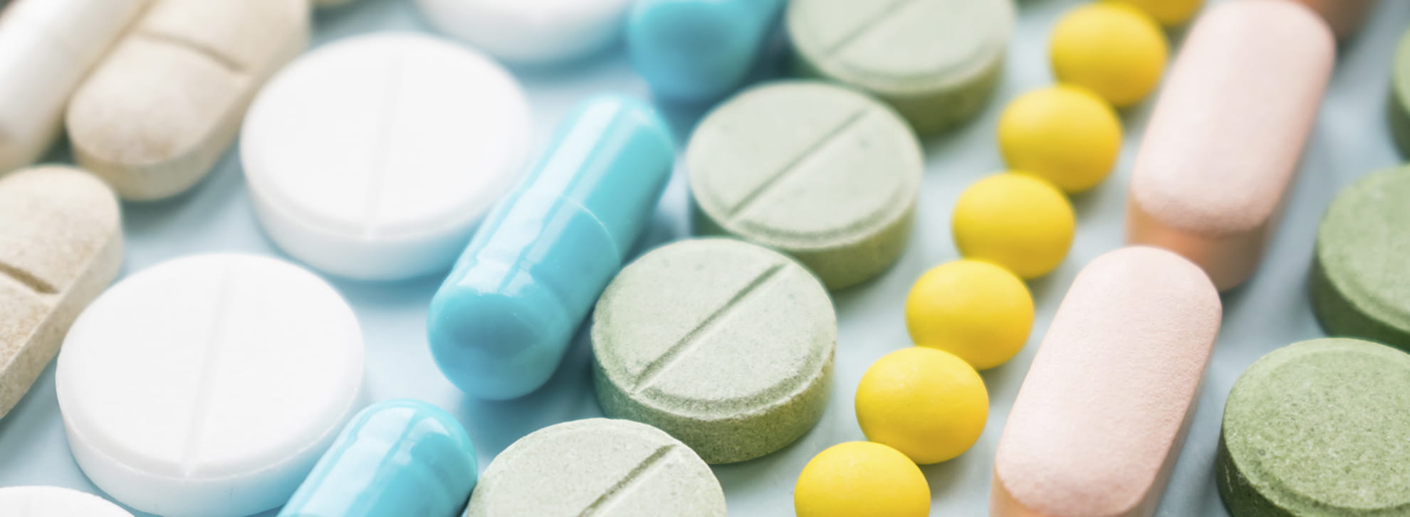 Different kinds of multicolored pills, opioids