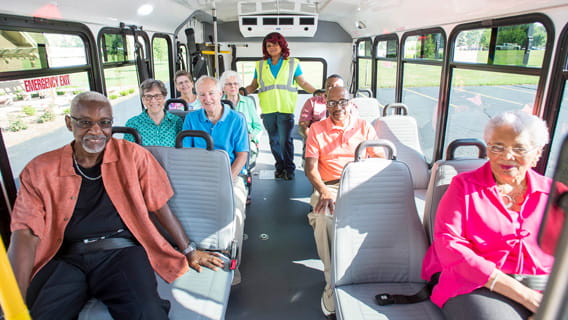 Seniors riding a bus
