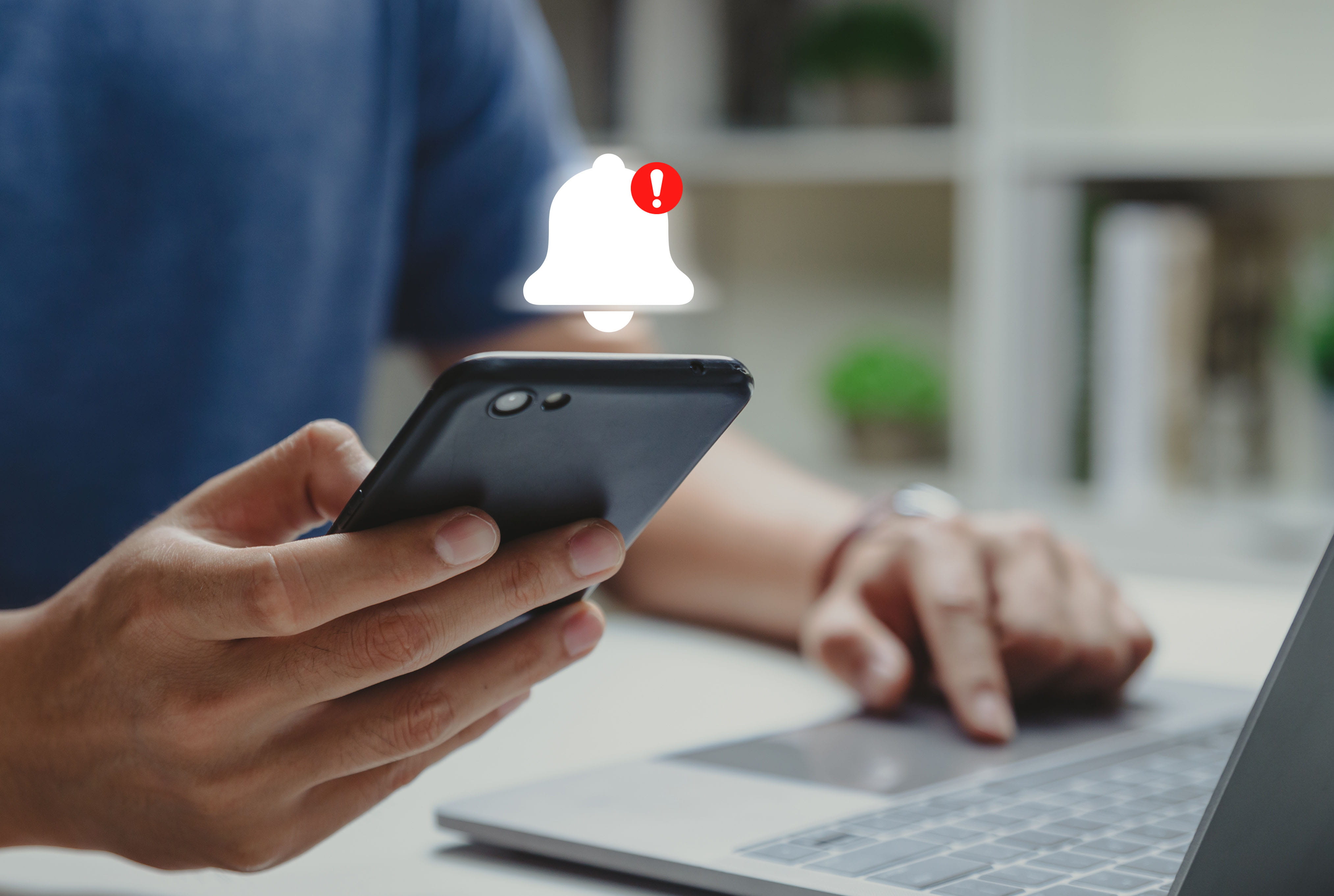 Person getting a notification on a mobile phone