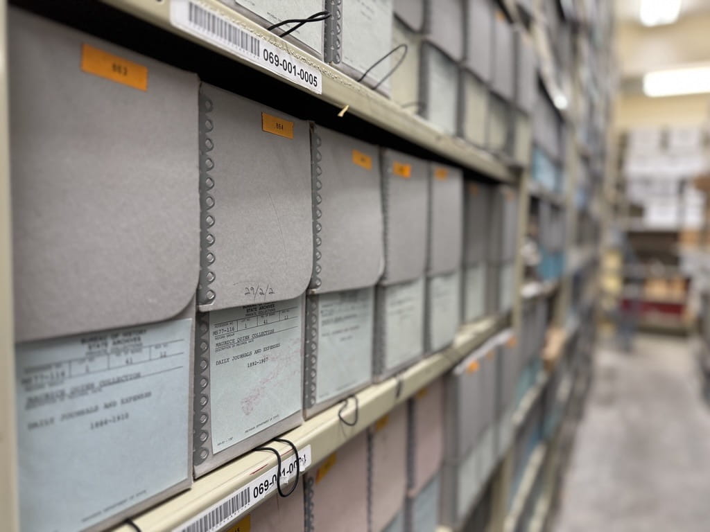 Boxes on metal shelving.