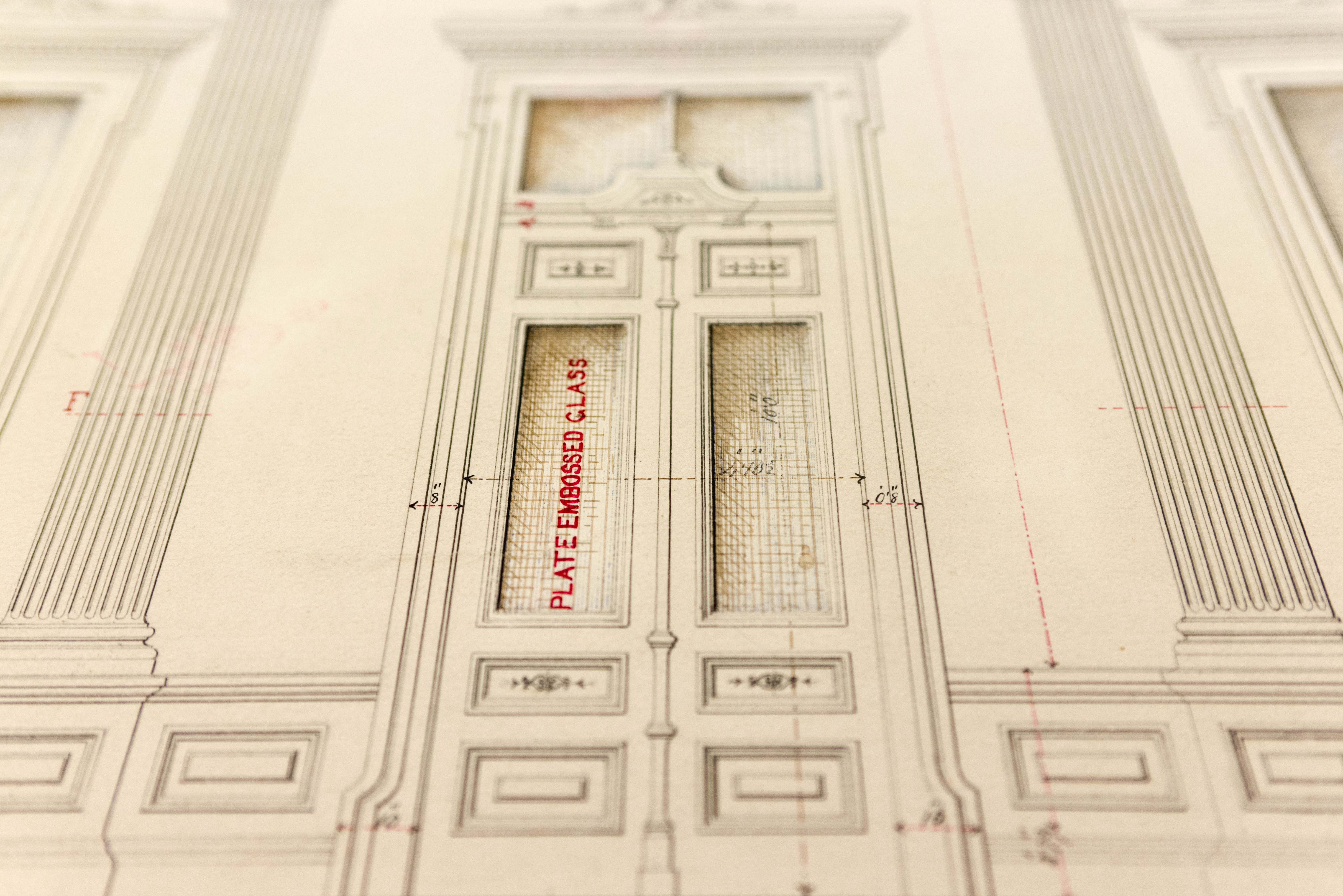 Architectural drawing focus on a drawing of a hallway and door.