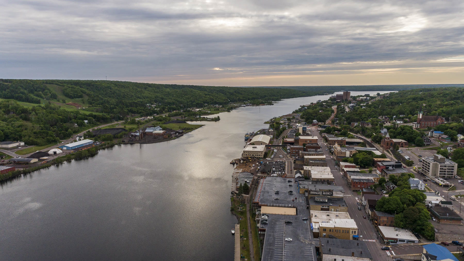 A river flowing next to a city.