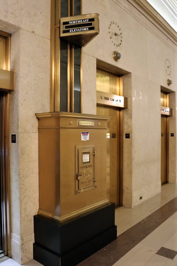 Cadillac Place - elevators and post box