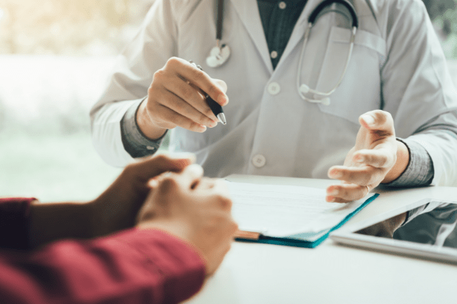 Doctor meeting with patient