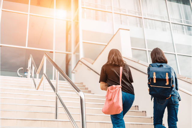 Two female students walking