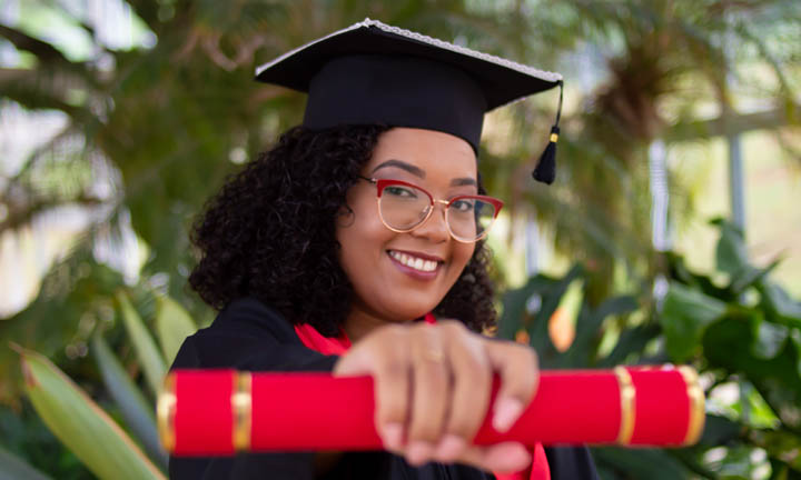 Student holding diploma
