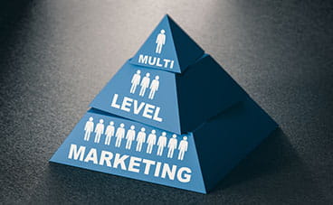 Broken apart blue pyramid; the top reads "Multi", the middle reads "Level," and the bottom reads "Marketing"