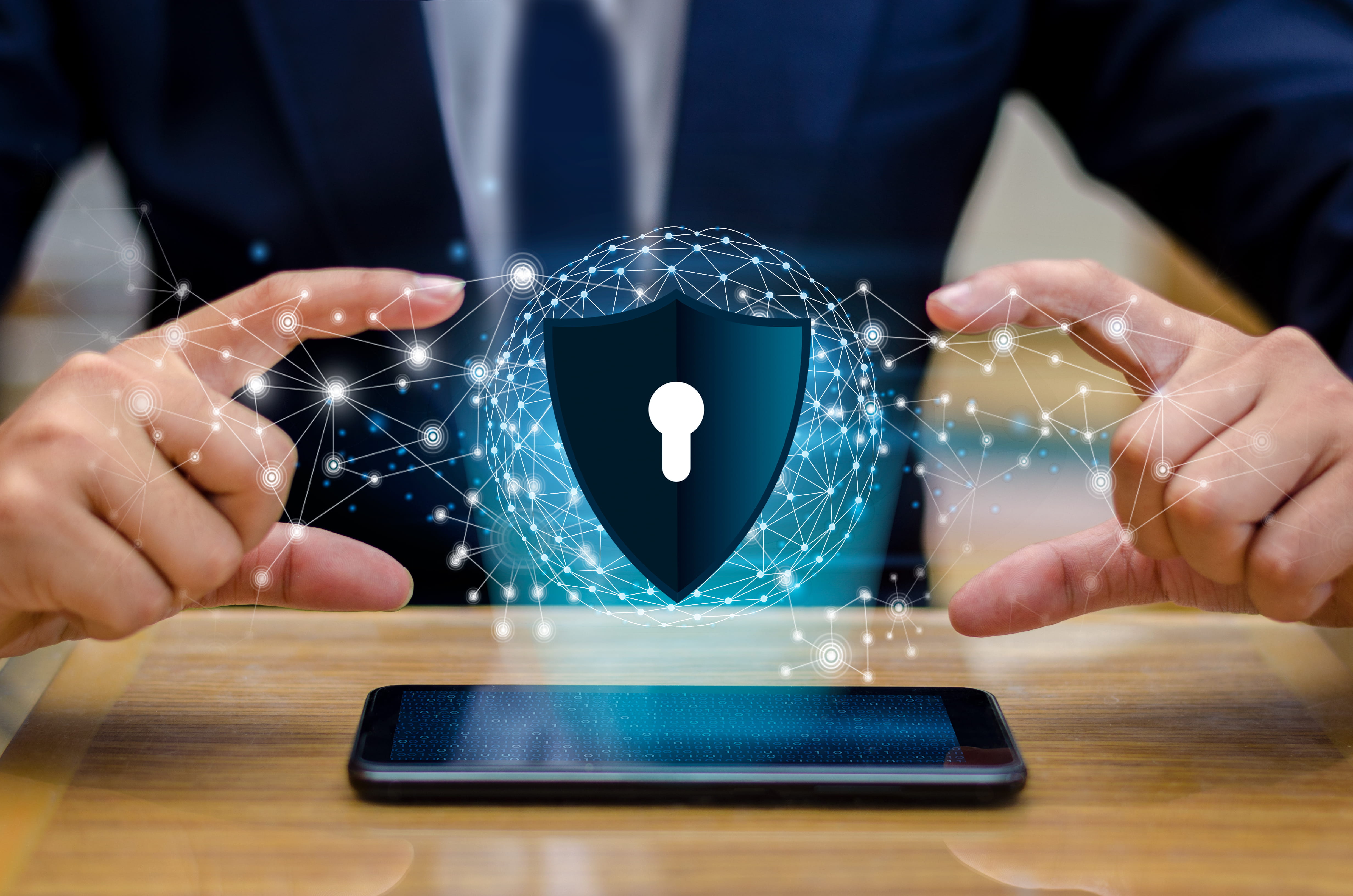 Businessman holding shield protect icon protection network security computer