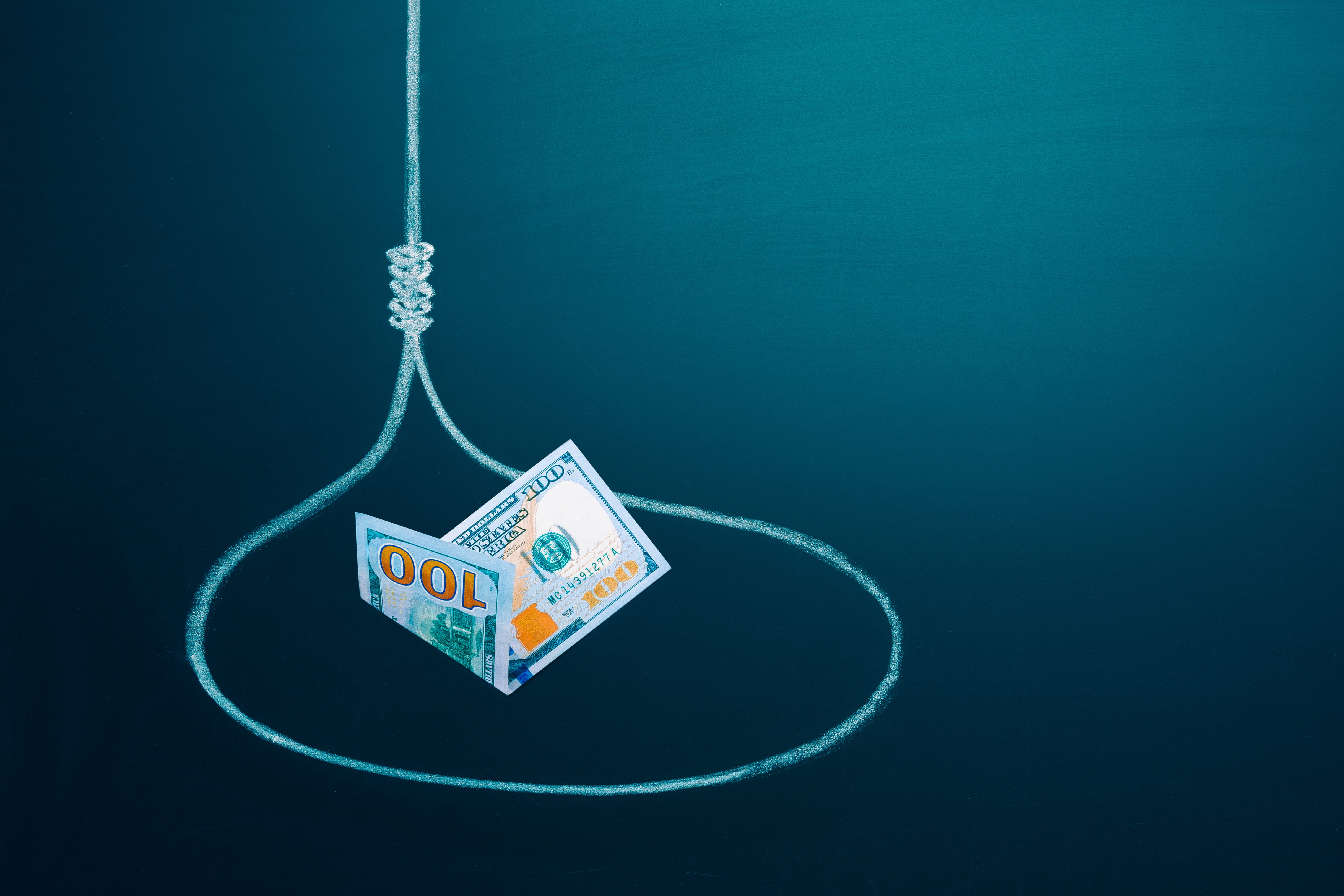 US 100 dollar bill in a loop as a bait