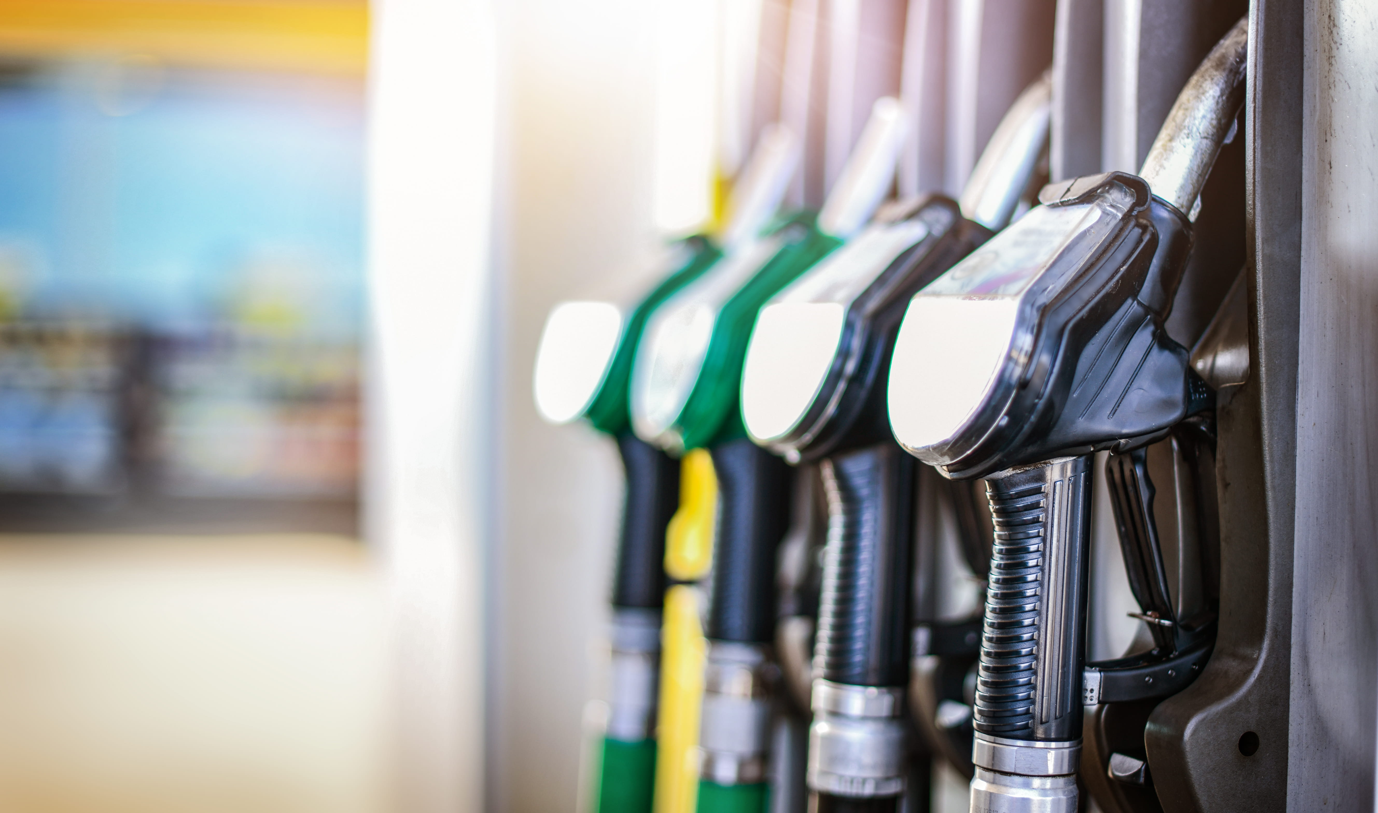 Close up of gas pump nozzles