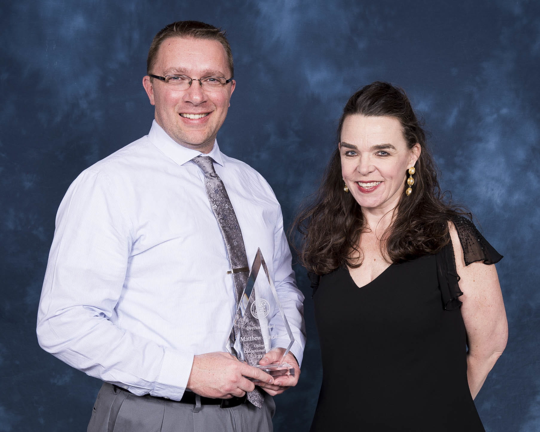 Image of Institutional Training Officer Matthew Clausen and Director Washington