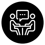 Graphic icon of two people talking at a table