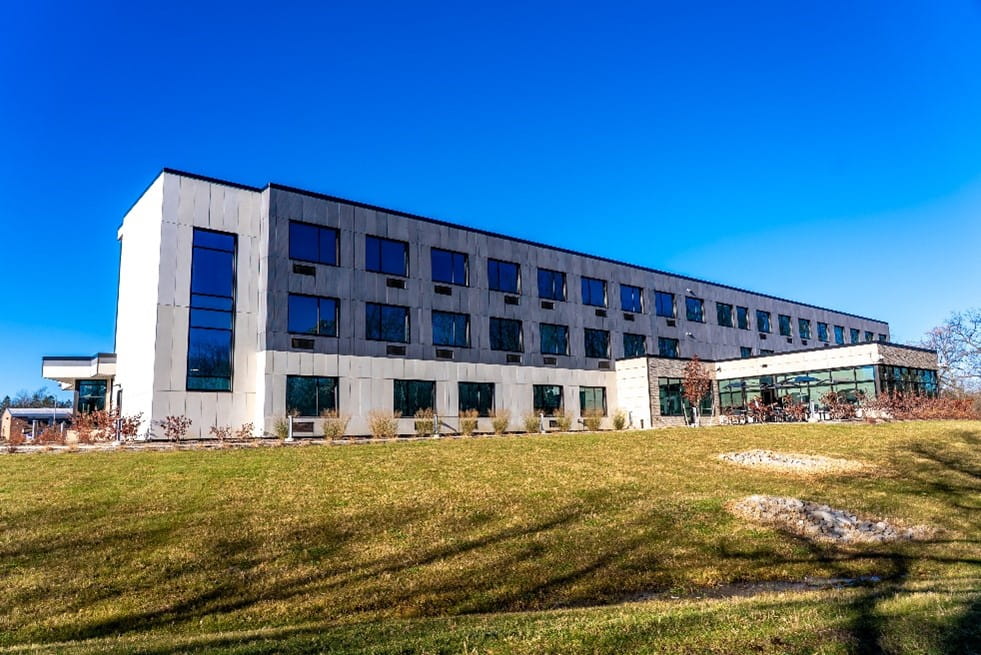 An exterior view of the dormitories at Green Oaks Training and Professional Development Center.