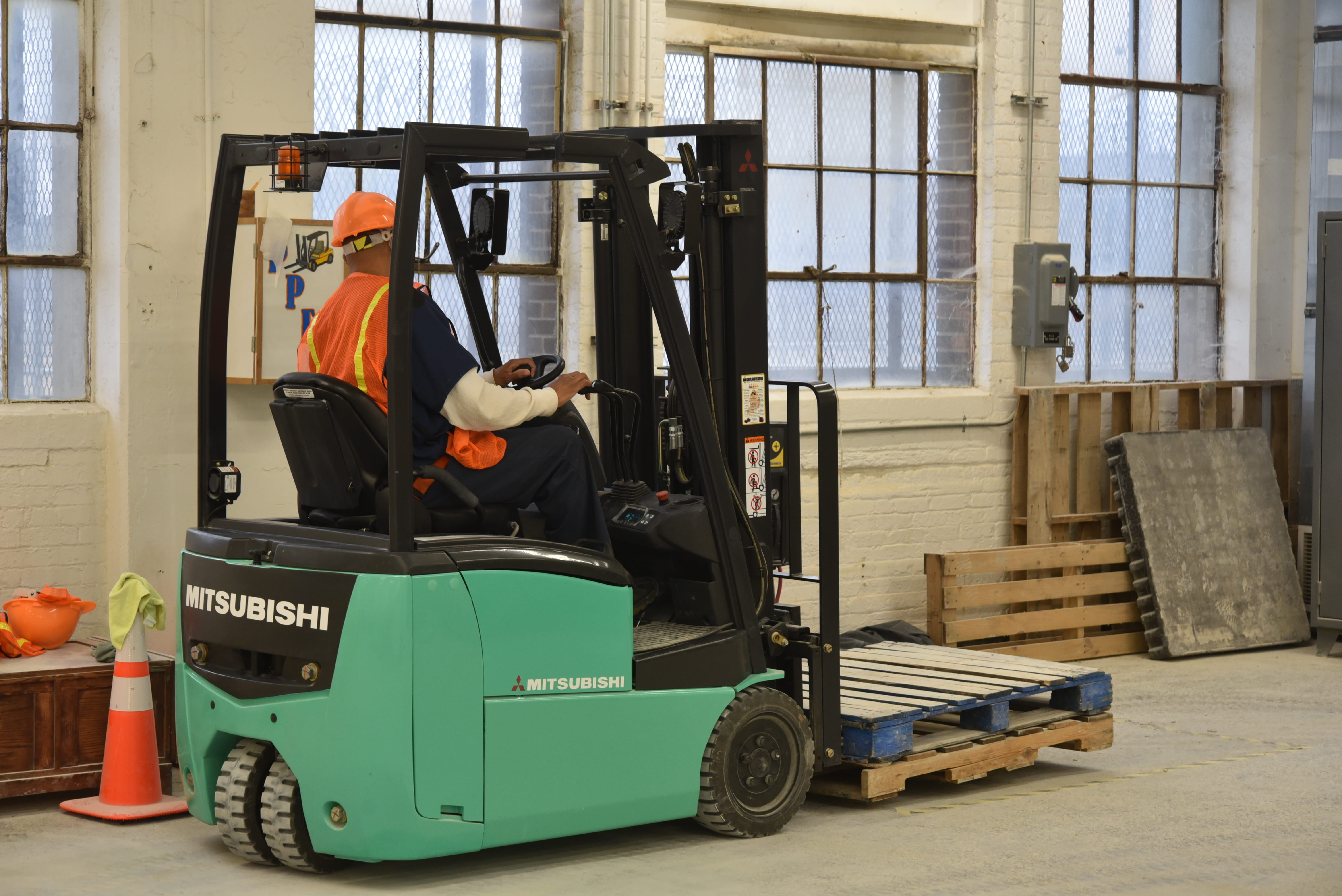 Photo of prisoner driving a forklift