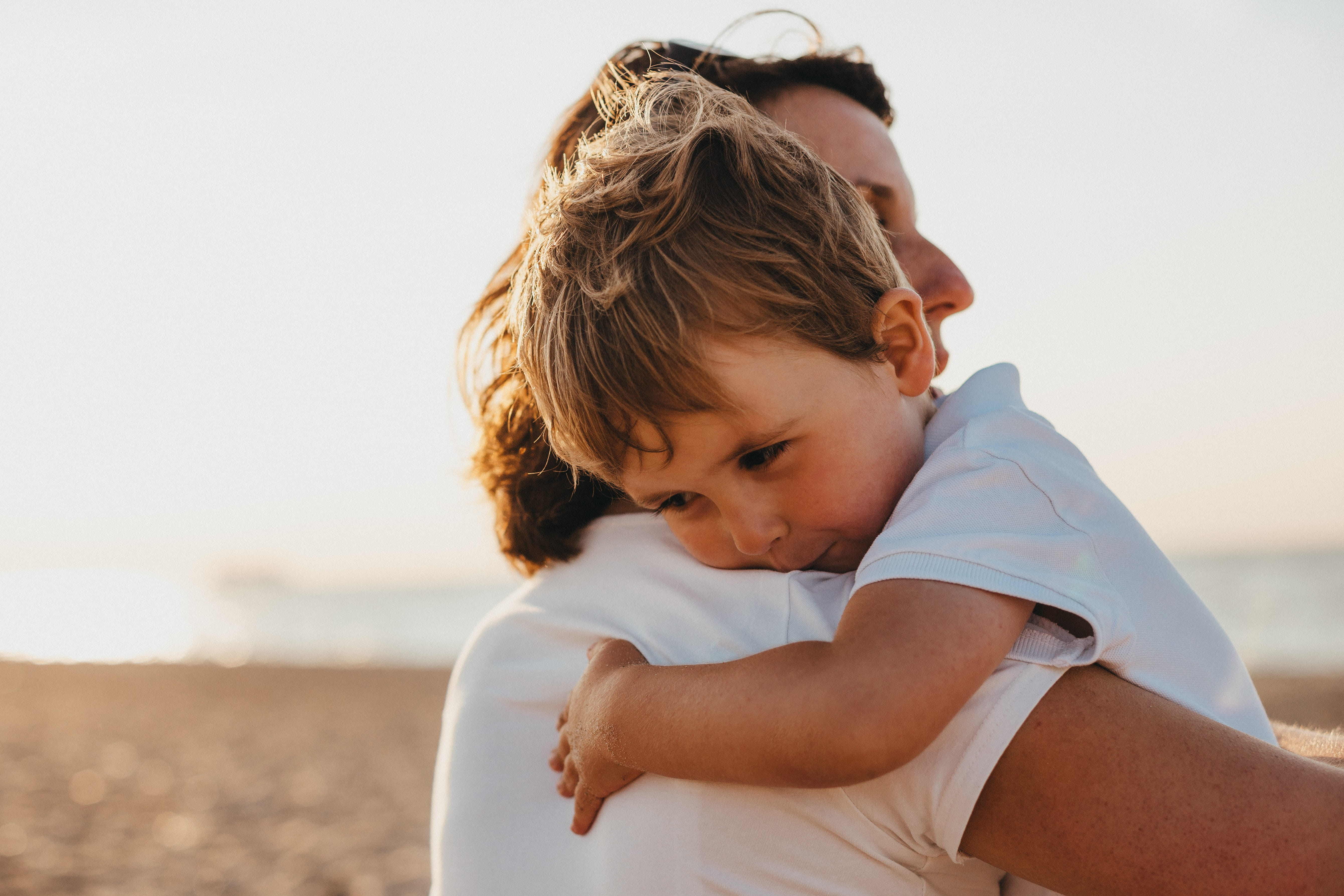 Photo of parent holding a toddler