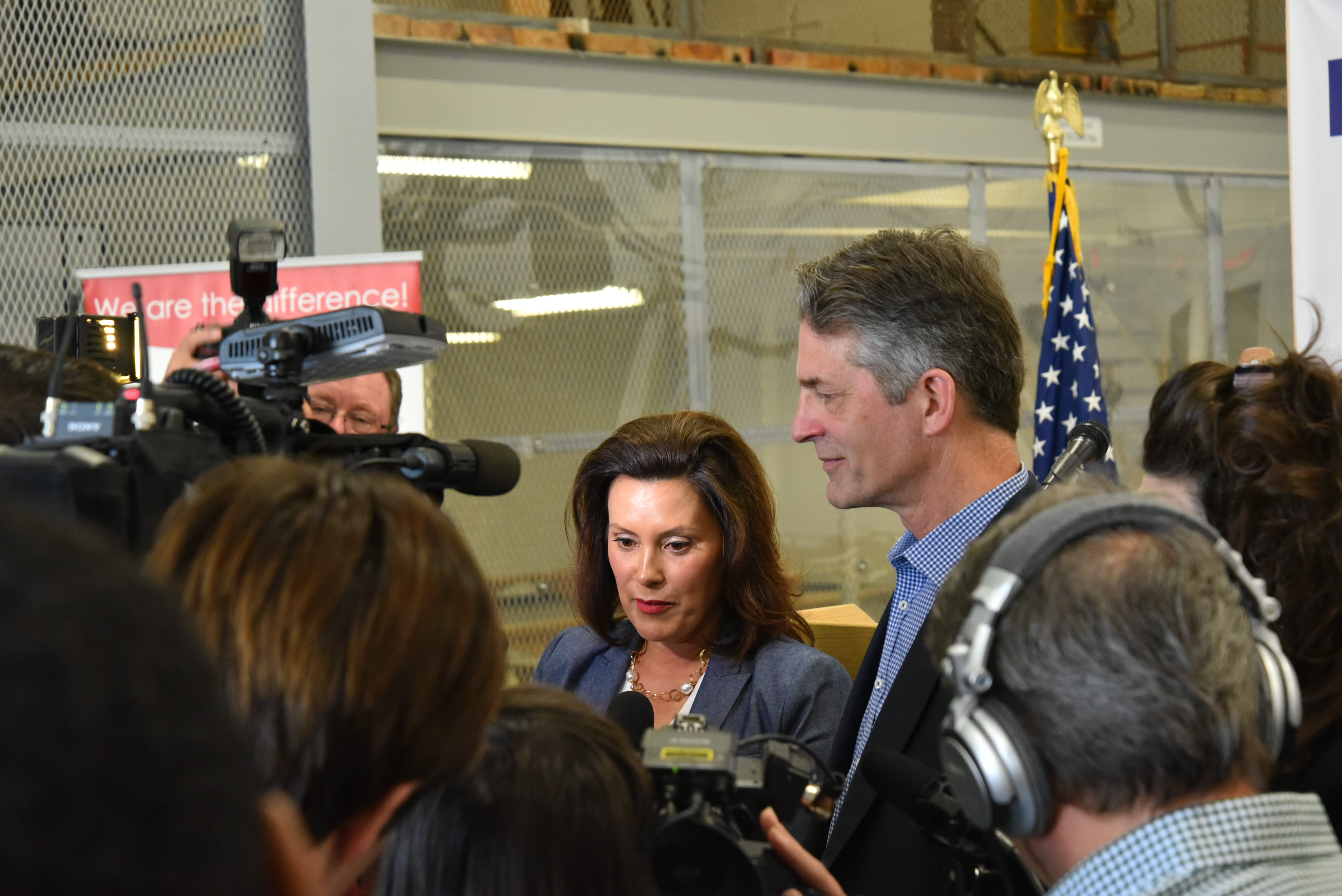 Photo of Governor Whitmer speaking to reporters.