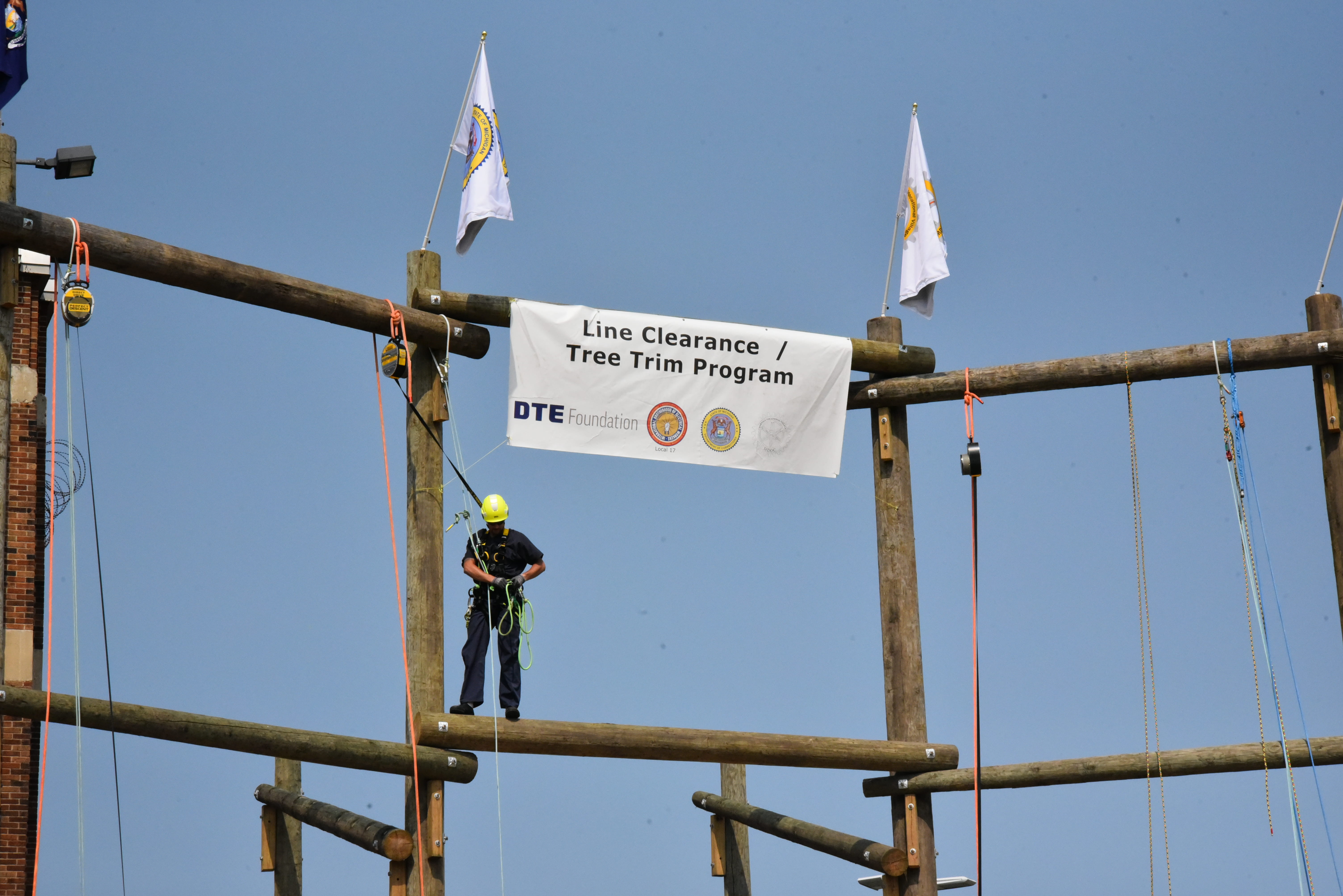 Photo of a prisoner reaching the top of the pole.