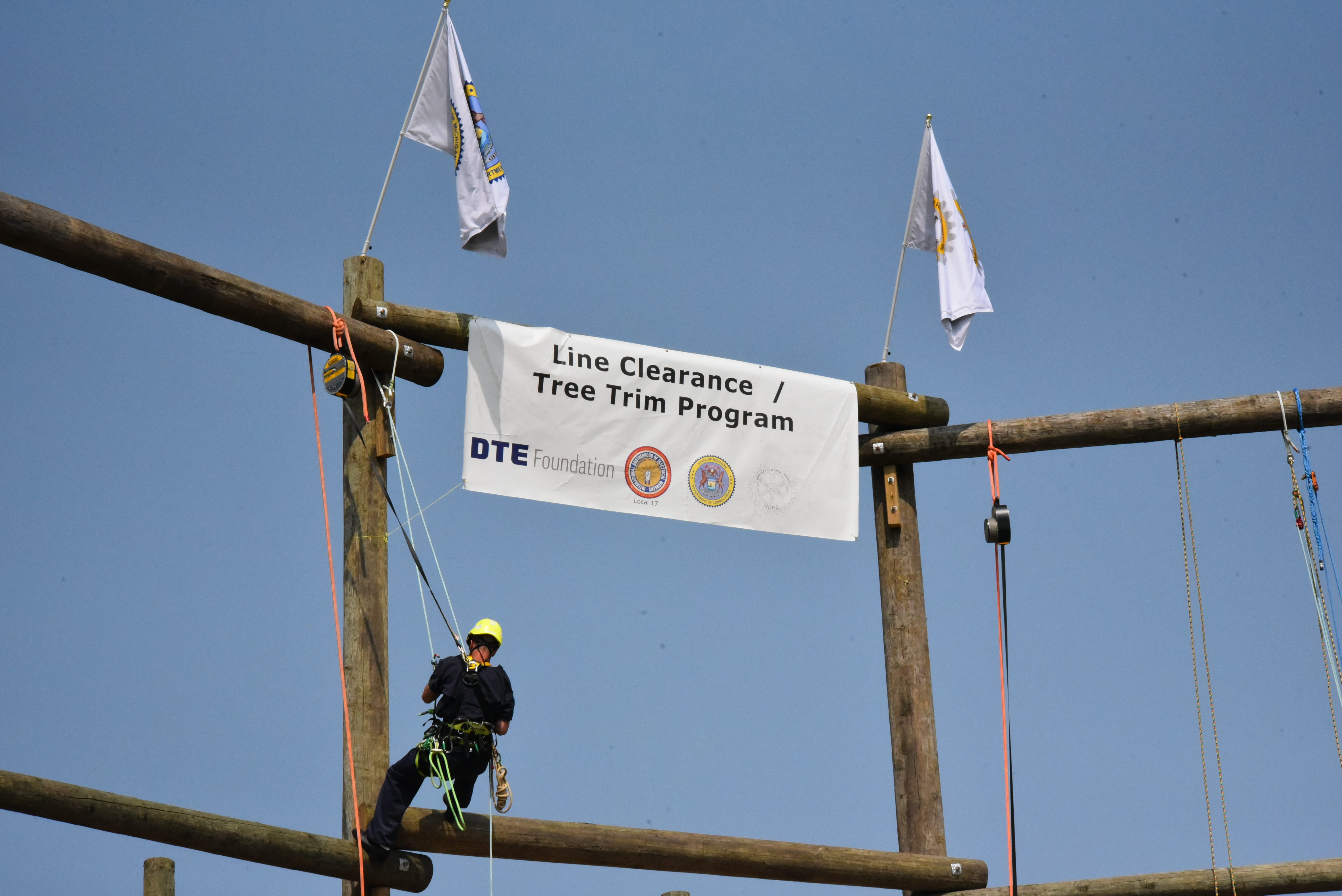 Photo of a prisoner reaching the top of the pole.