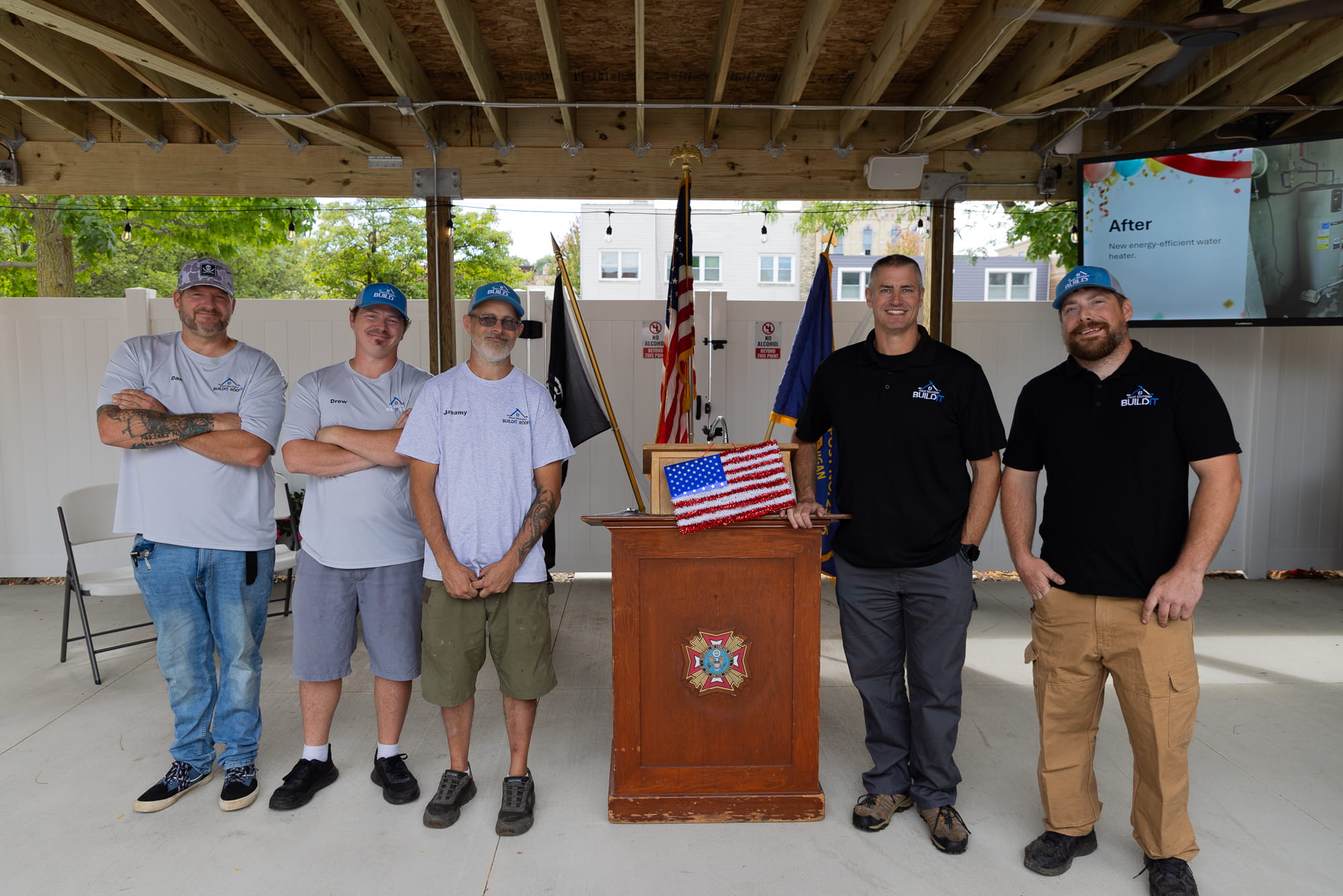 Contractors posing for photo during groundbreaking event.