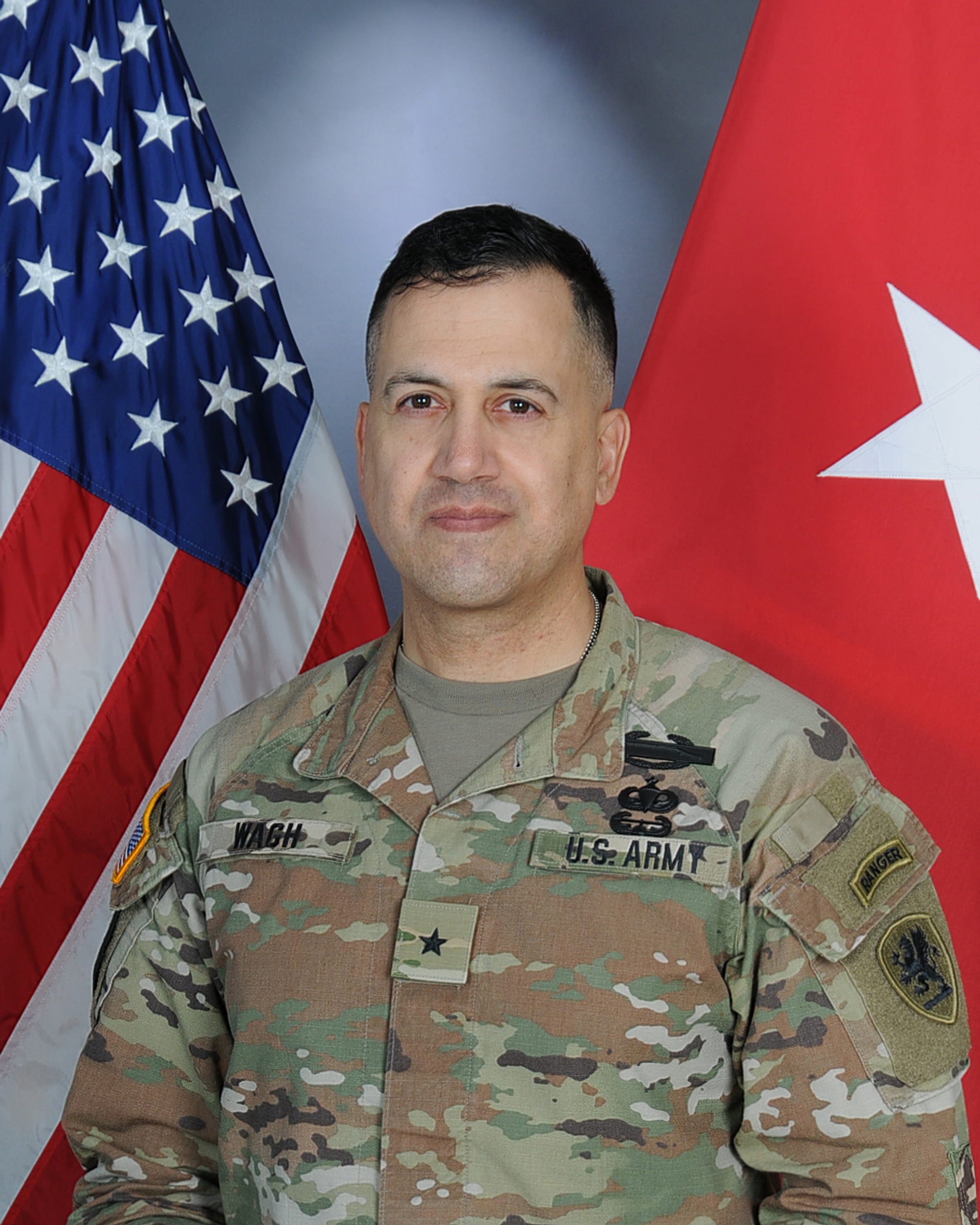 Light-skinned man wearing military uniform