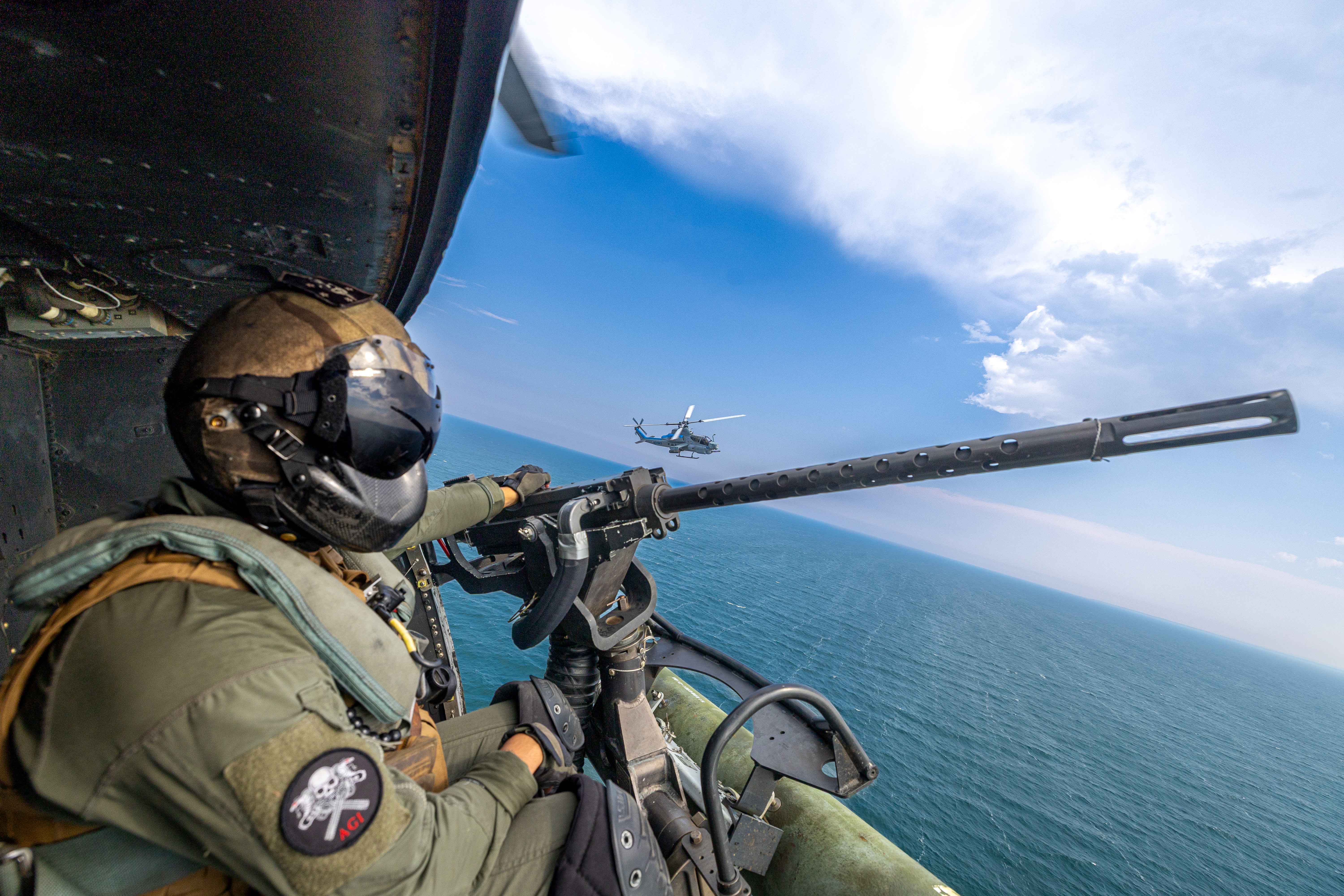 helicopter circling over open sea