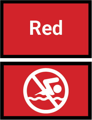 Double red flags, one with the word red and one with a safety icon