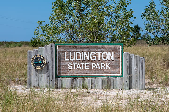 The sign for Ludington State Park