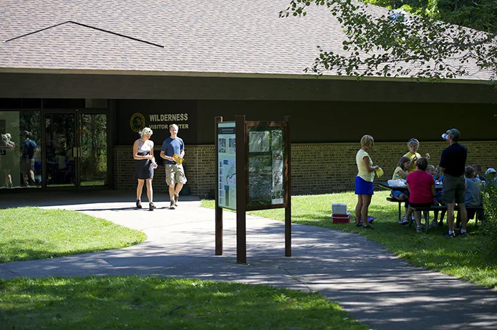 Park visitors exiting the Visitor Center