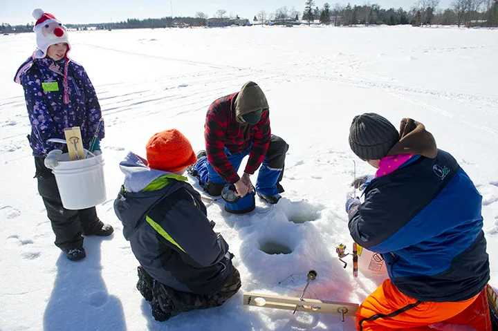 An ice fishing class at the Carl T. Johnson Center
