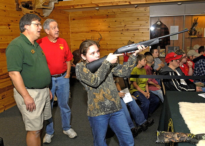 A girl practicing shooting skills