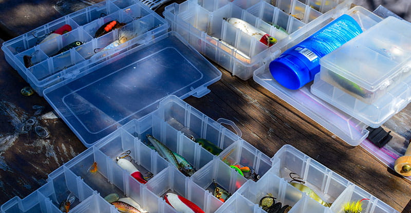a box of assorted fishing lures