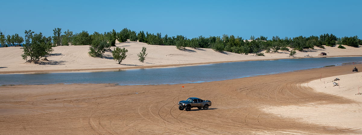 a truck riding the dunes