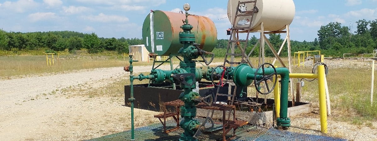 gas well equipment in a field