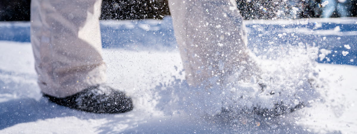 feet stomping in snow